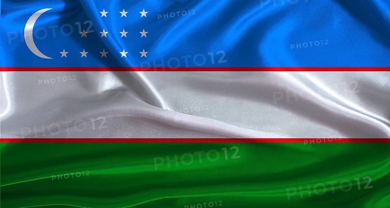Uzbekistan flag with cloth textured background. National flag of Uzbekistan with realistic texture