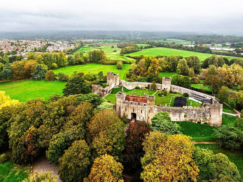 Autumn Colours over ruins of Caldicot Castle from a drone, Caldicot, Monmouthshire, Wales, UK