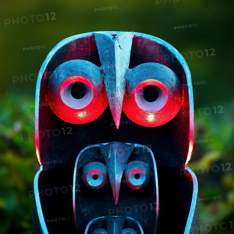 Illumination of an owl-like object during the HerbstlichtGarten event in Sauerlandpark in the evening in Hemer, Sauerland, North Rhine-Westphalia, Germany
