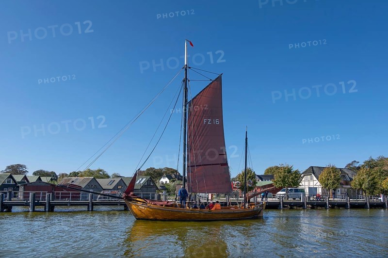 Zeesboot, former historic fishing boat in the port of Ahrenshoop, blue sky, Darß, Mecklenburg-Western Pomerania, Germany