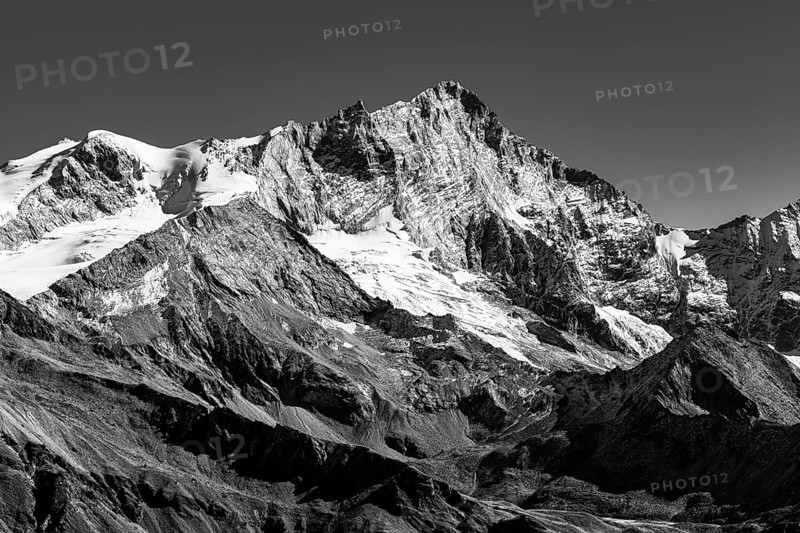 Snowy peak of Weisshorn mountain, black and white photo, Val d'Anniviers, Valais Alps, Canton of Valais, Switzerland