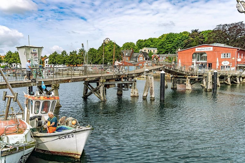 Eckernförde wooden bridge and the Siegfried shipyard at the inland port in Eckernförde, Schleswig-Holstein, Germany