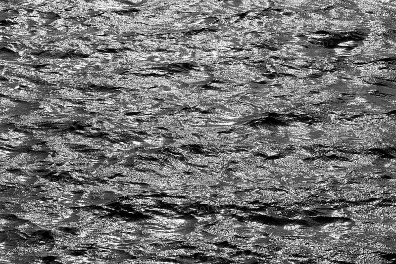 Water surface with waves and light reflections, black and white, Möhnesee, Möhnetalsperre, North Rhine-Westphalia, Germany