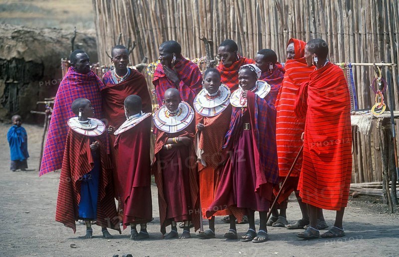 Maasai men and girls in their village in Ngorongoro Crater, Tanzania, Africa, June 2000, vintage, retro, old, historic