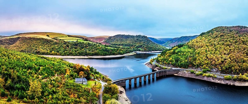 Autumn over Garreg Ddu Dam from a drone, Elan Valley, Caban-Coch Reservoir, Rhayader, Wales, UK