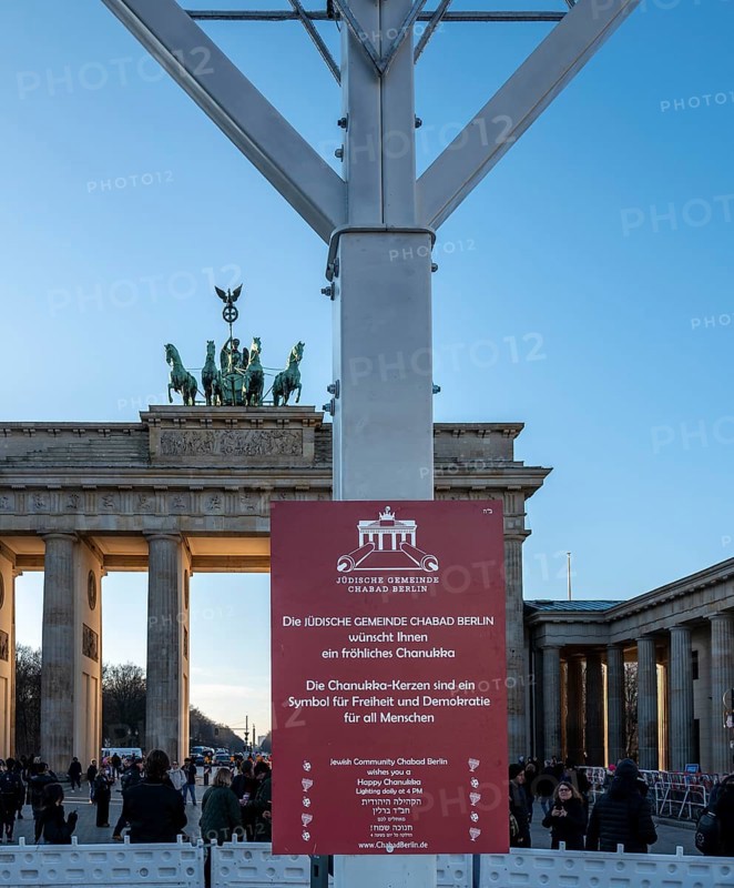 Large Hanukkah chandelier at the Brandenburg Gate in daylight, sign of lively Jewish life, symbolic power for 20 years, Berlin, Germany