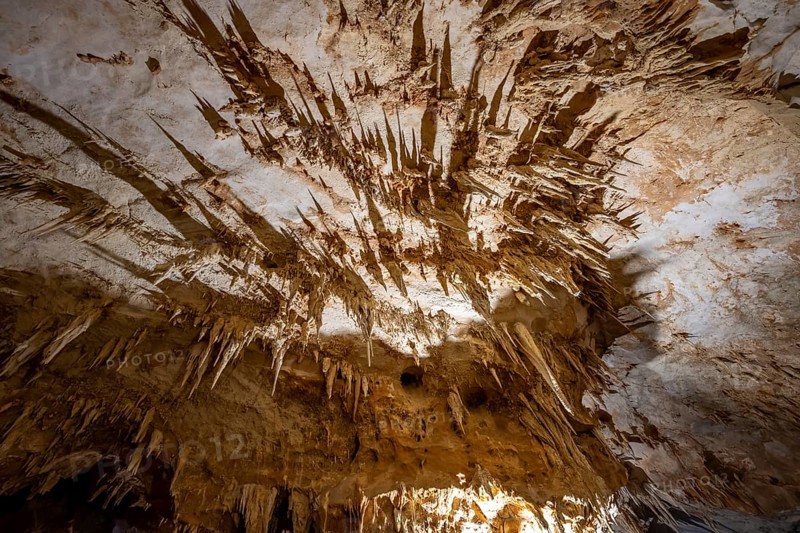 Stalactites and rock formations in a stalactite cave, Grotta del Fico, Gulf of Orosei, Baunei, Sardinia, Italy