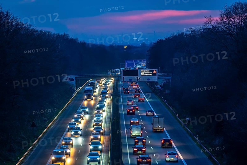 Evening traffic on the A52 motorway, between Düsseldorf and Essen, in front of the Breitscheid motorway junction, partly slow rush hour traffic, looking south, North Rhine-Westphalia, Germany