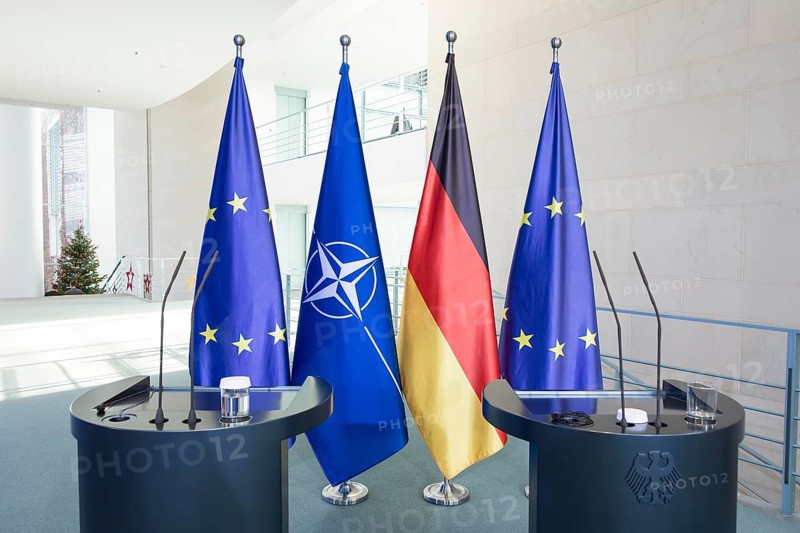Flags of the Federal Republic of Germany, the EU and NATO after a press conference by Mark Rutte (Secretary General of NATO) and Friedrich Merz (Chancellor of the Federal Republic of Germany, CDU) following a one-on-one meeting at the Federal Chancellery, Berlin, 11 December 2025
