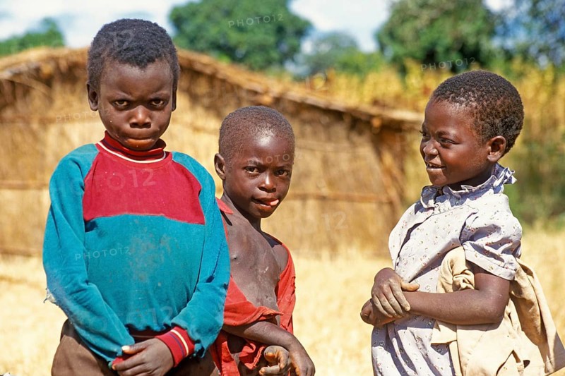 Children posing for the camera on the side of the road, Bwangu Mzimba, Malawi, Africa, June 2000, vintage, retro, old, historical