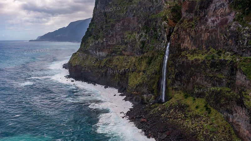 Waterfall flows into the sea, Miradouro do Véu da Noiva, Madeira, Portugal