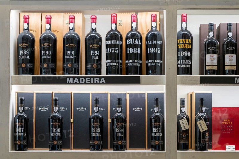 Madeira wine, wine bottles are on shelf, Madeira, Portugal