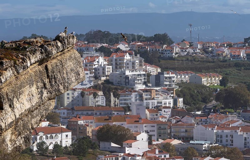 View from Leuct Tower towards orange tiled roofs in the town of Nazare, Estremadura, Portugal