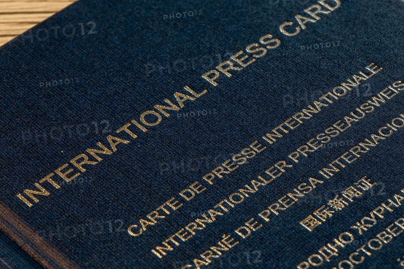 Close-up of an international press pass