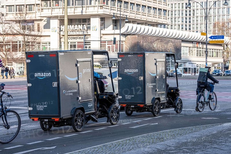 E-cargo bike, e-cargo bike delivery vehicle, pedal drives with e-motor assistance, from the mail-order company Amazon, from a micromobility center near Alexanderplatz, the electric mini transporters in the inner city area deliver over 1.5 million parcels annually, the manufacturer of the e-cargo bikes is the German company Mubea, from Sauerland, Germany