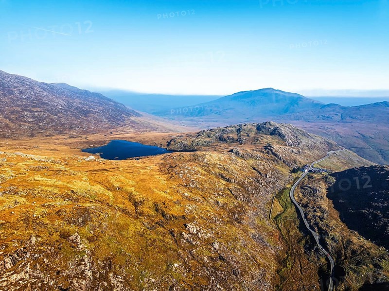Autumn colours over Llyn Cwmffynnon and Miner's Track, Start Point, road A4086 from a drone, Pen-y-Pass, Snowdonia, Wales, UK