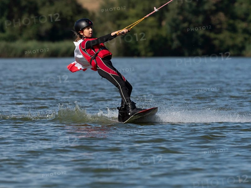 Boy or girl with wakeboard, sporty on the water, active water sports, wake park