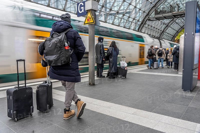 Central Station in Berlin, passengers on the platform, train arrives, Germany