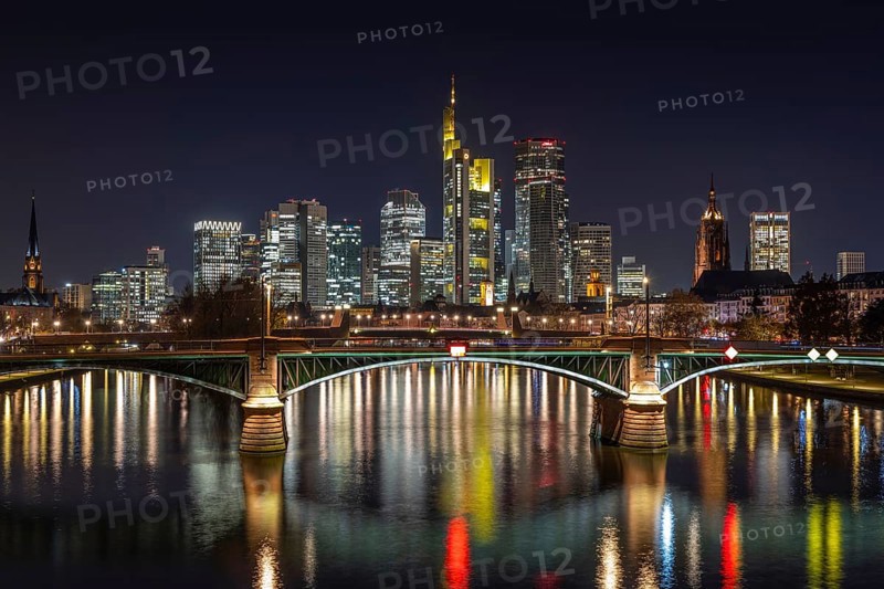 The lights of Frankfurt's banking skyline glow in the evening, Frankfurt am Main, Hesse, Germany
