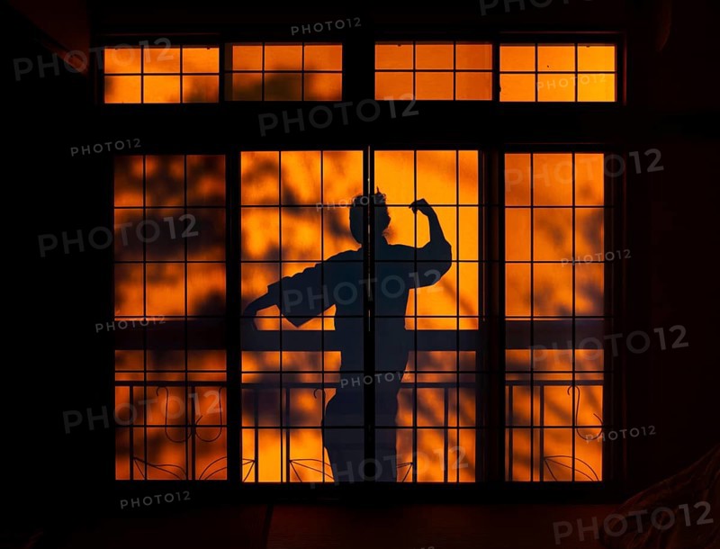 Shadows of a woman in kimono, on the balcony behind sliding shoji doors in a traditional Japanese house, ninja, Yamanouchi, Nagano, Japan
