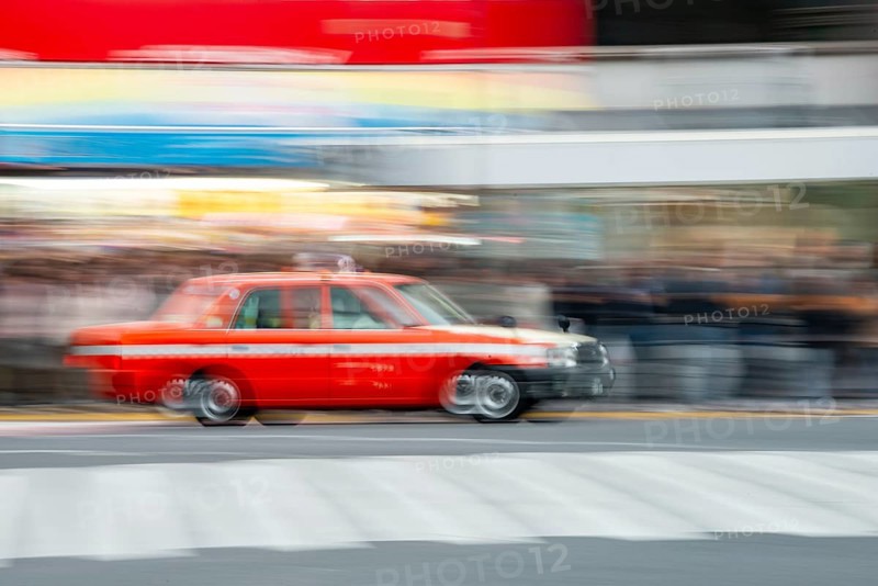 Black taxi driving, motion blur, long exposure, Shubuya Crossing, Shibuya, Tokyo, Japan