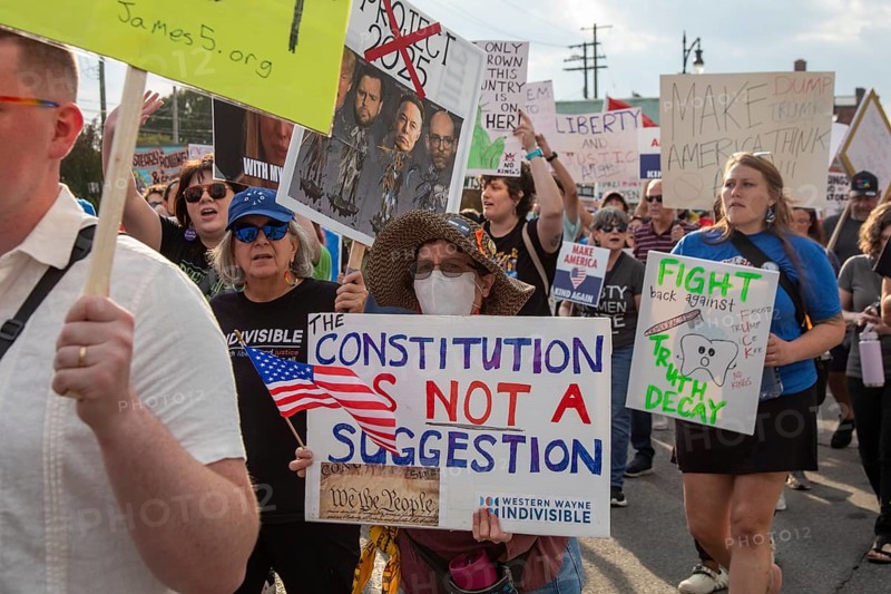 Detroit, Michigan USA - 18 October 2025 - A large crowd gathered for a 'No Kings' rally, protesting President Trump's actions against immigrants and against democratic institutions