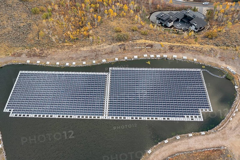 Park City, Utah - Floating solar panels provide power for Mountain Regional Water. The solar array is on the raw water storage pond at the water utility's Signal Hill Treatment Plant