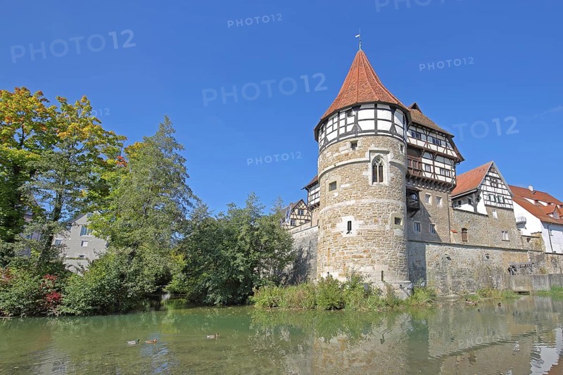 Zollern Castle built around 1255 with water tower on the Eybach stream, half-timbered house, autumn, castle, Balingen, Swabian Alb, Baden-Württemberg, Germany