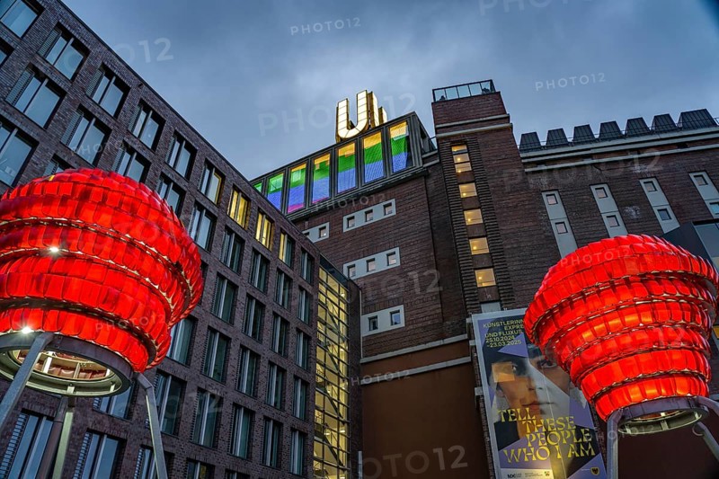 Illuminated sculptures of Dortmund roses in front of Dortmund's landmark U, Centre for Art and Creativity at dusk, Dortmund, North Rhine-Westphalia, Germany