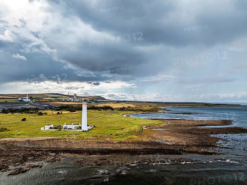 Rain Clouds over Barns Ness Lighthouse from a drone, Dunbar, East Lothian, Scotland, UK