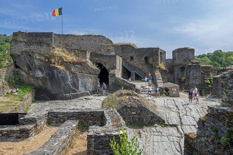 9th century medieval ruined hill castle overlooking the city La Roche-en-Ardenne in summer, province of Luxembourg, Ardennes, Wallonia, Belgium