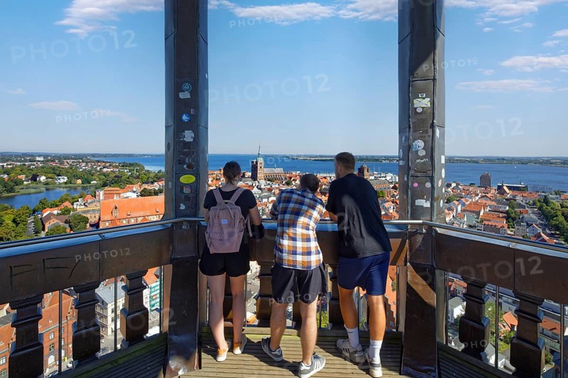 Visitors look out over the city, viewing platform view at a height of 84 metres, St. Mary's Church, also known as Marienkirche, basilica, late Gothic, three naves with transept, first mentioned in 1298, Neuer Markt, Old Town, UNESCO World Heritage Site, Hanseatic City of Stralsund, Mecklenburg-Western Pomerania, Germany
