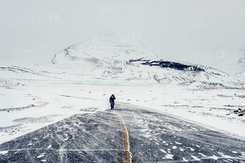 Winter road trip on the Icefields Parkway with lots of snow and ice, Banff National Park, Jasper National Park, Alberta, Canada
