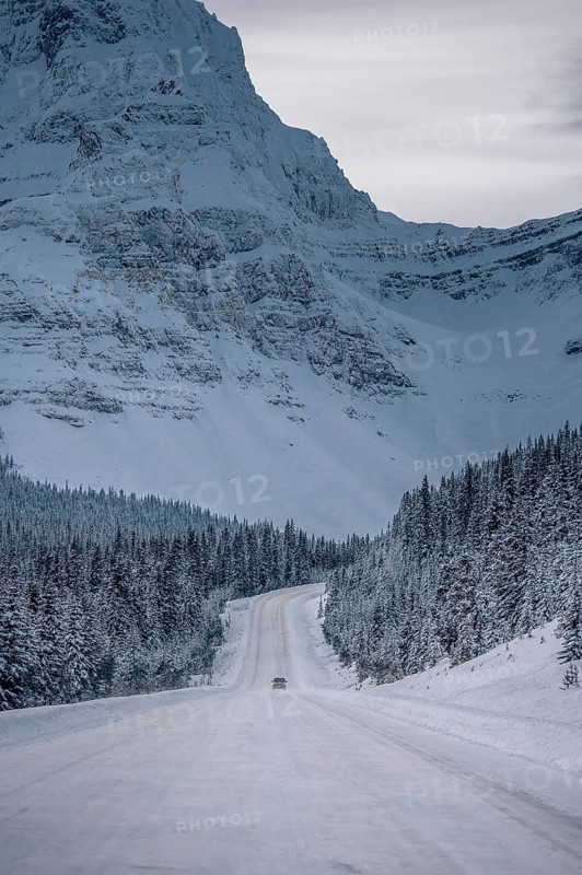 Winter road trip on the Icefields Parkway with lots of snow and ice, Banff National Park, Jasper National Park, Alberta, Canada