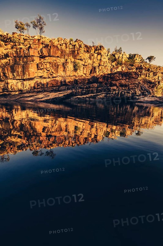 Bell Gorge waterfall, a body of water in north-west Australia in the Kimberley. Sunrise in the outback, Australia