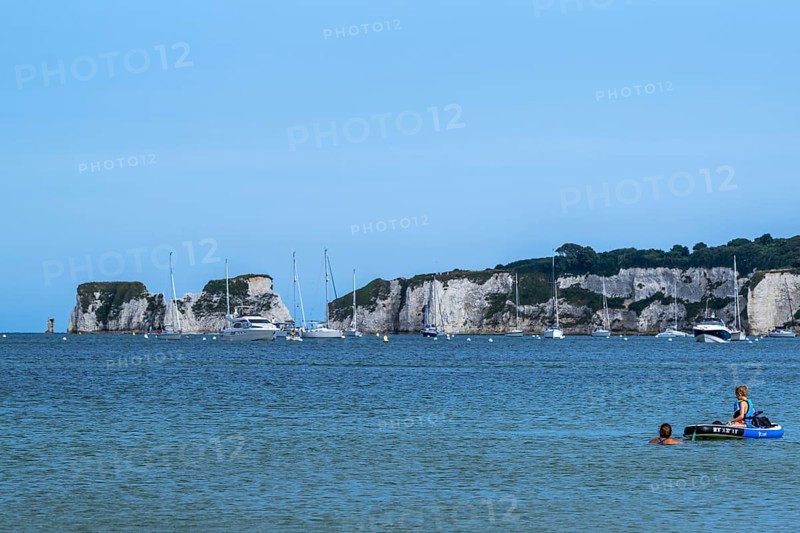 Boats on sea over Knoll Beach Studland, Poole, Dorset, England, United Kingdom