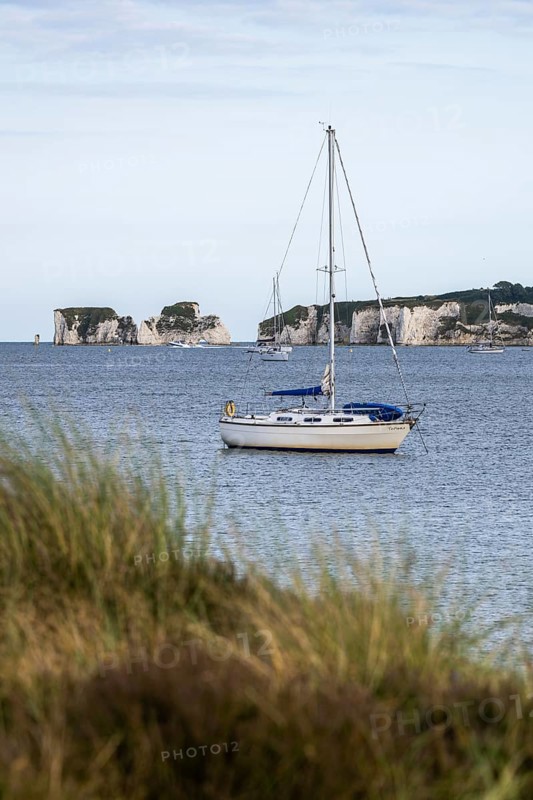 Boats on sea over Knoll Beach Studland, Poole, Dorset, England, United Kingdom