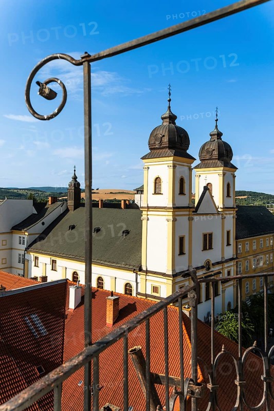 View from the city tower of the Piarist Church of St Francis Xavier and the old town in the evening light, Capital of Culture 2026, Trencín, Slovakia