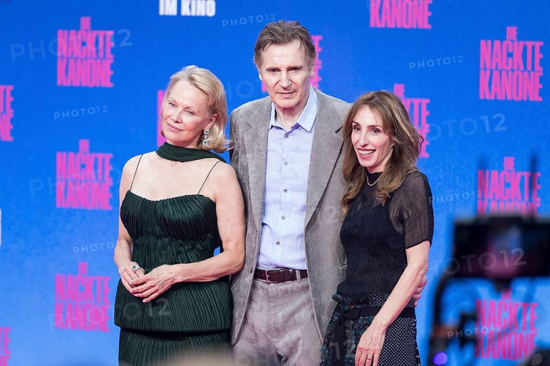 Pamela Anderson, Liam Neeson and Erica Huggins (producer) at the film premiere of The Naked Gun at UCI Luxe East Side Gallery, Berlin, 24.07.2025
