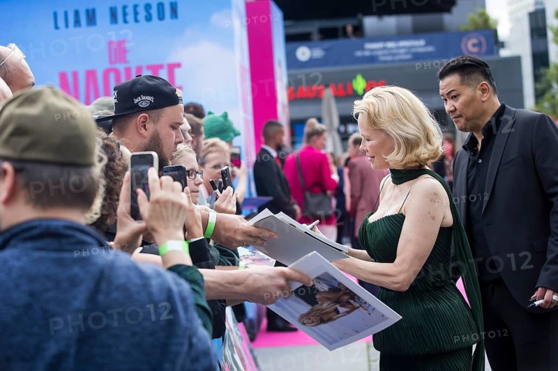 Pamela Anderson signs autographs in front of the film premiere of The Naked Gun at UCI Luxe East Side Gallery, Berlin, 24.07.2025