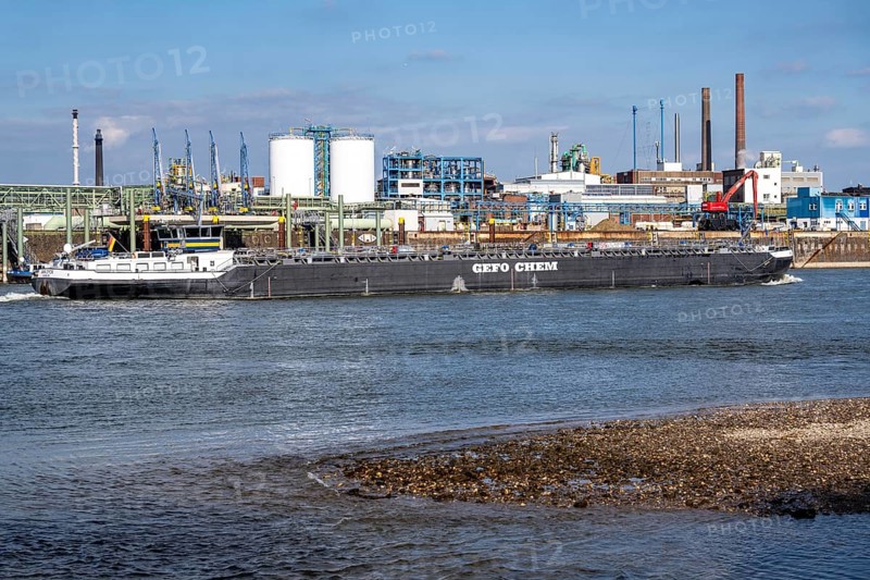 Scenery of Chempark Leverkusen, Bayer Leverkusen, chemical park, chemical plant, river Rhine, cargo ship, North Rhine-Westphalia, Germany