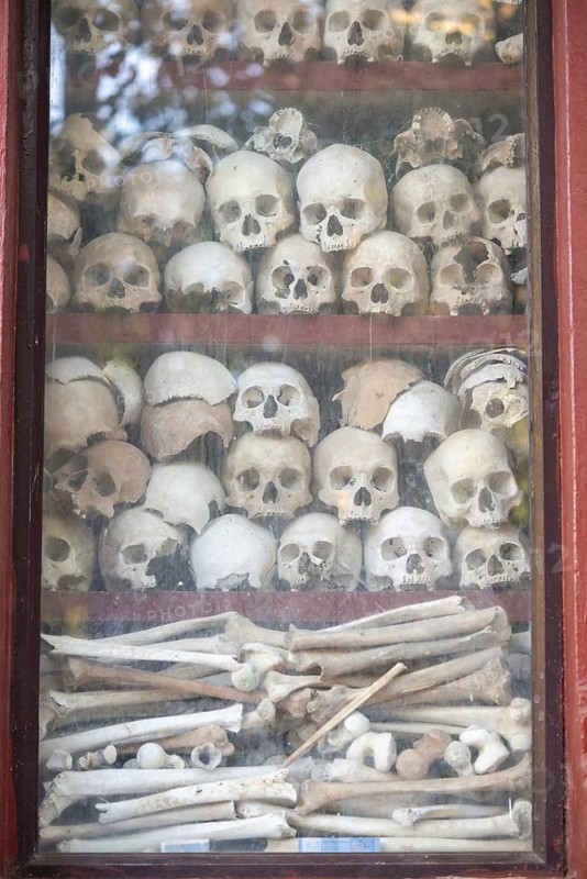 Shrine with human skull, memorial to the victims of the Khmer Rouge regime, Wat Thmei, Siem Reap, Cambodia