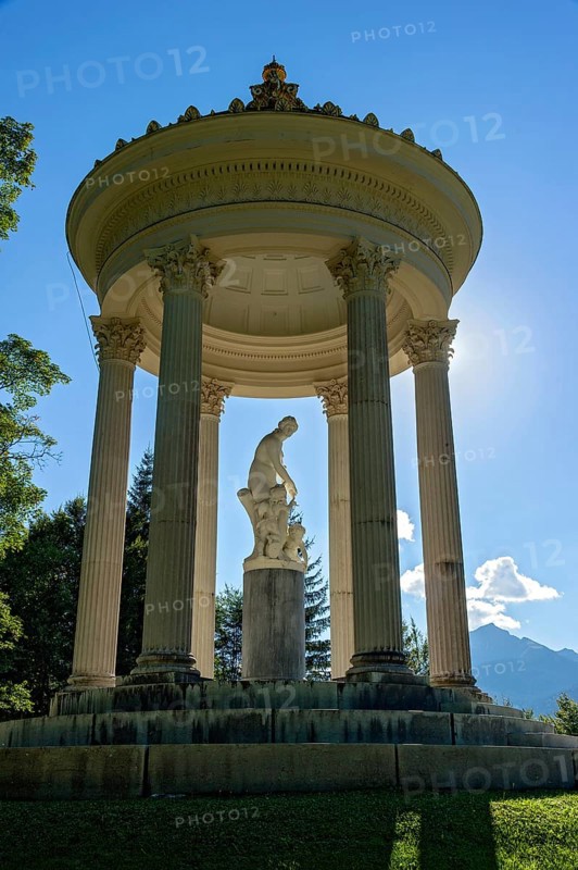 Statue of Venus with Cupid in the Temple of Venus above the terraced gardens, backlight, long shadows, blue sky, park of Linderhof Castle, UNESCO World Heritage Site, Ettal, Unterammergau, Garmisch-Partenkirchen, Upper Bavaria, Bavaria, Germany
