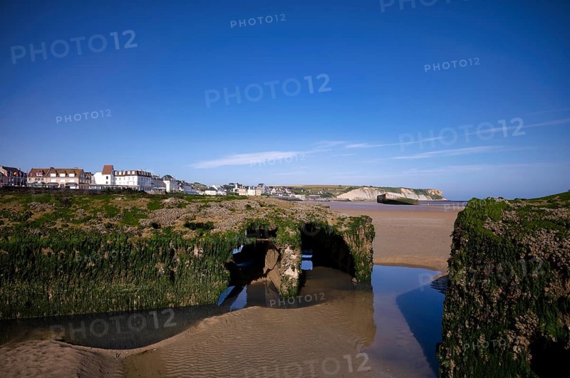 Phoenix Caissons, concrete boxes, caissons, were used in the sea as breakwaters and to form an improvised harbour, Mulberry B Harbour, Mulberry Harbour, Port Winston, Gold Beach, beach, D-Day, Operation Overlord, Arromanches-les-Bains, Normandy, Calvados, France