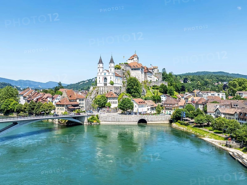 Aarburg town on the river Aare with church and fortress Aerial view from above in Aarburg, Switzerland
