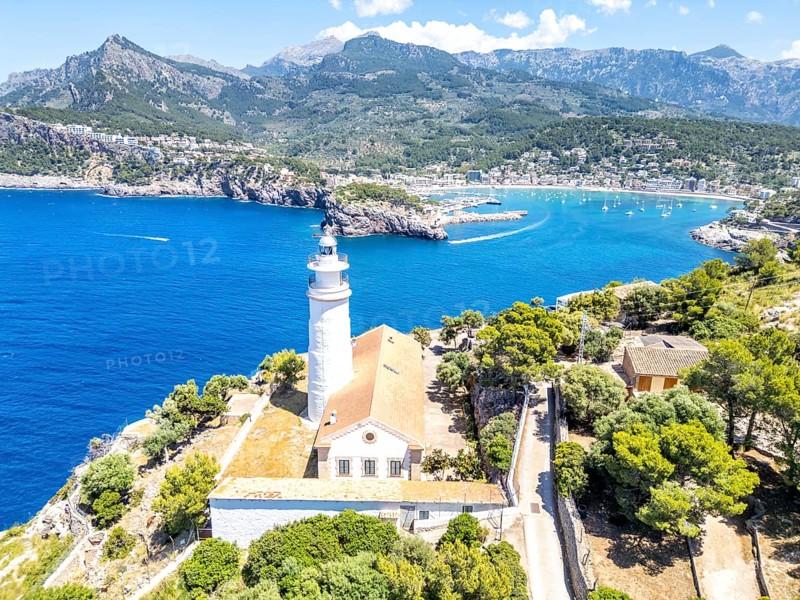 Port de Soller on Majorca with lighthouse aerial view holiday by the sea trip in Spain