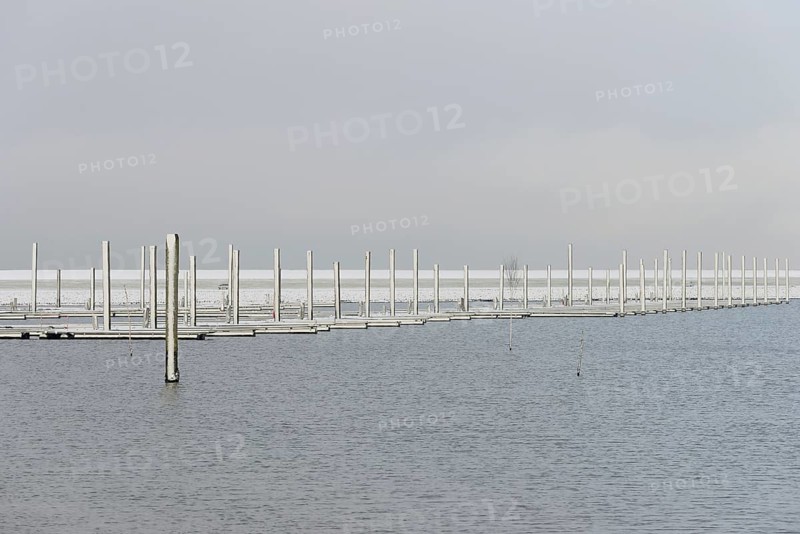 Winter day, onset of winter, snow on the jetties in the marina, North Sea, Norddeich, Lower Saxony, Germany