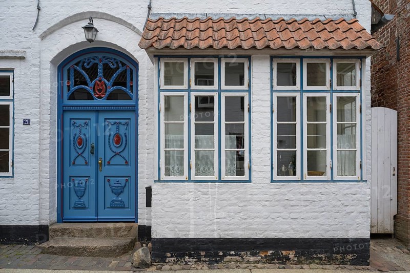 Beautiful ornate door mullion window, facade, old town, Husum, North Frisia, Schleswig-Holstein, Germany