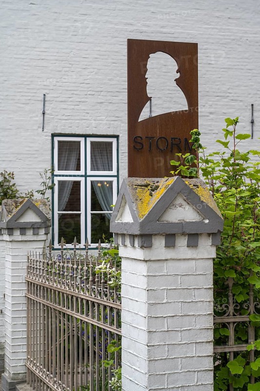 Sign and fence at the Theodro Storm House, Theodor Storm Centre, Museum, Old Town, Husum, North Frisia, Schleswig-Holstein, Germany
