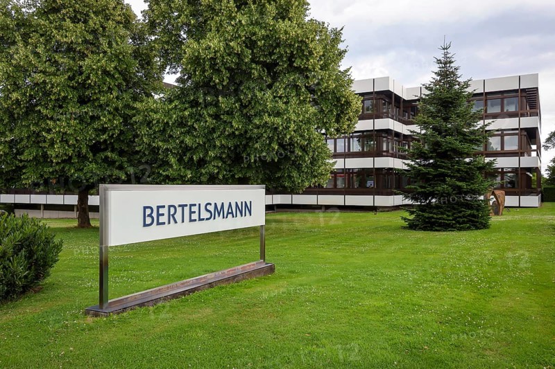 Gütersloh, North Rhine-Westphalia, Germany - BERTELSMANN, Head Office of Bertelsmann SE & Co. KGaA. Bertelsmann is an international media, services and education company headquartered in Gütersloh. The Bertelsmann Stiftung is one of the largest German foundations. Bertelsmann's operating divisions include RTL Group (entertainment), Penguin Random House (books), BMG (music), Arvato Group (services), Bertelsmann Marketing Services (direct marketing and print activities), Bertelsmann Education Group (education) and Bertelsmann Investments (venture capital activities and growth division Bertelsmann Next)